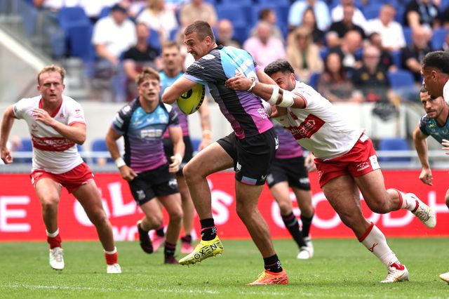 Jake Arthur of Hull FC is tackled by Rhyse Martin of Hull KR during the Betfred Super League Magic Weekend match Hull KR vs Hull FC at Hill Dickinson Stadium, Liverpool, United Kingdom on 04 July 2026

(Photo by Alfie Cosgrove/News Images)