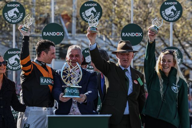 Patrick Mullins, Stewart Andrews and Willie Mullins lift the Grand National Trohpy during the Randox Grand National 2025 Day 3 Grand National Day at Aintree Racecourse, Liverpool, United Kingdom, 5th April 2025

(Photo by Mark Cosgrove/News Images)