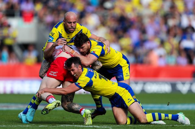 Warrington Wolves players pile on during the Betfred Challenge Cup Semi-final match Warrington Wolves vs Leigh Leopards at Totally Wicked Stadium, St Helens, United Kingdom, 11th May 2025

(Photo by Gareth Evans/News Images)