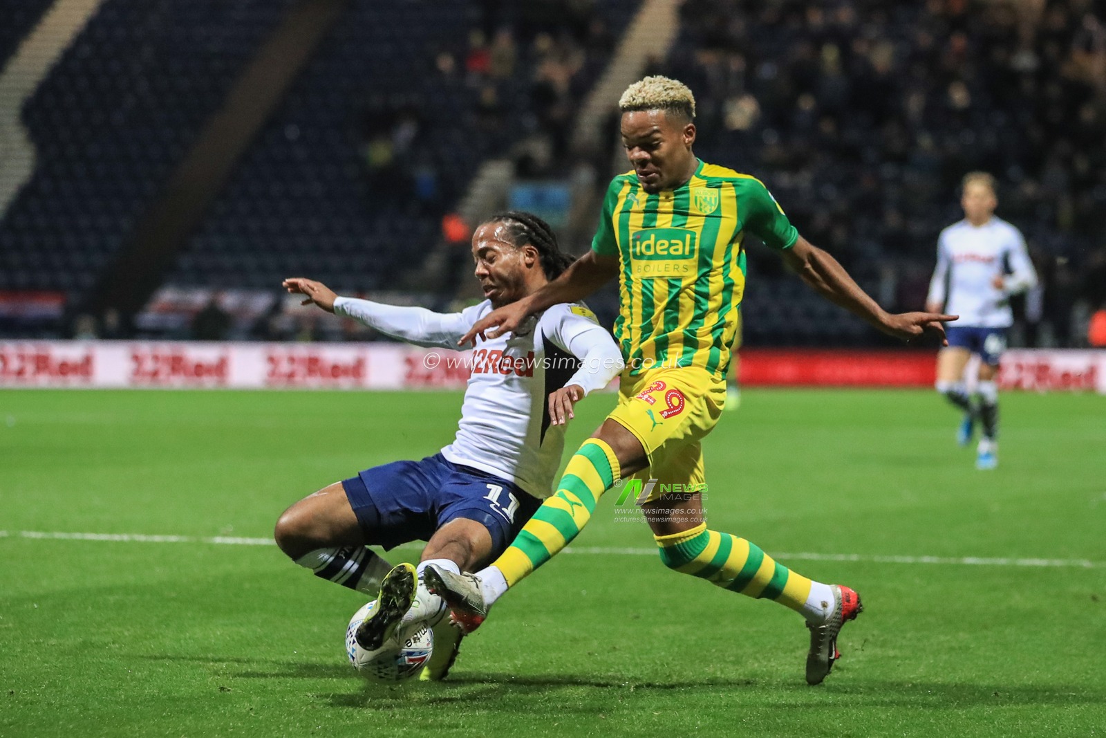 2nd December 2019, Deepdale, Preston, England; Sky Bet Championship, Preston North End v West Bromwich Albion : Daniel Johnson (11) of Preston North End slides in to win the ball from Grady Diangana of West Bromwich Albion  

Credit: Mark Cosgrove/News Images