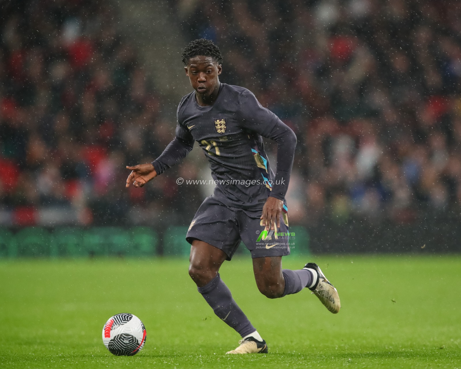 Kobbie Mainoo of England breaks with the ball during the International Friendly match England vs Belgium at Wembley Stadium, London, United Kingdom, 26th March 2024

(Photo by Gareth Evans/News Images)