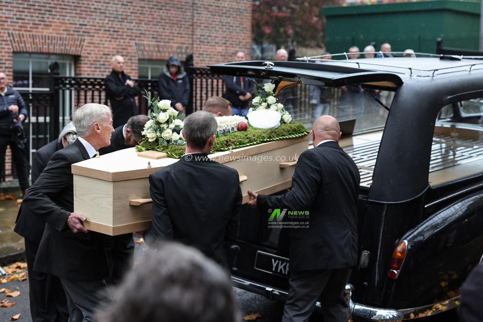 Harold Dennis “Dickie” Bird OBE coin is placed into the hearse during the Funeral of Harold Dennis “Dickie” Bird OBE at St Mary's Church, Barnsley, United Kingdom, 19th October 2025

(Photo by Mark Cosgrove/News Images)
