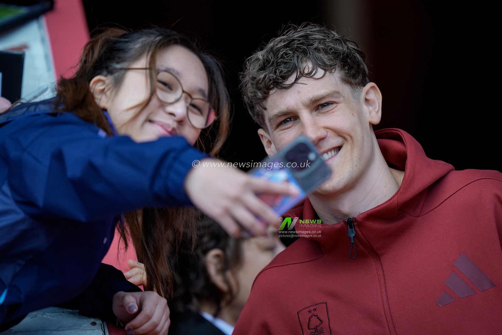 Ryan Yates of Nottingham Forest takes a selfie with a fan during the Premier League match Nottingham Forest vs Newcastle Untied at City Ground, Nottingham, United Kingdom on 10 May 2026

(Photo by Maynard Manyowa/News Images)