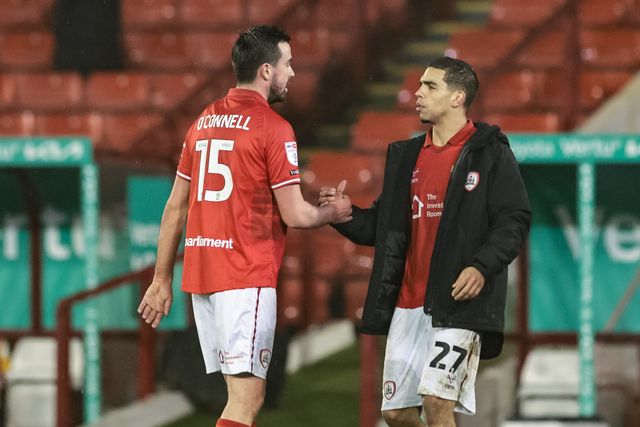 Eoghan O'Connell of Barnsley shakes hands with Tennai Watson of Barnsley during the Sky Bet League 1 match Barnsley vs Northampton Town at Oakwell, Barnsley, United Kingdom, 3rd February 2026

(Photo by Mark Cosgrove/News Images)
