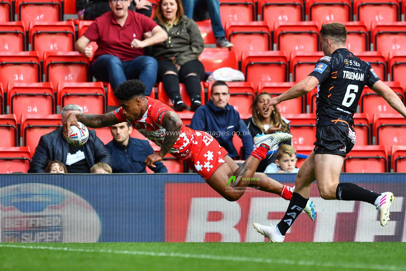 26th May 2019 , Anfield Stadium, Liverpool, England; Dacia Magic Weekend, Betfred Super League Round 16, St Helens vs Castleford Tigers ; Kevin Naiqama (3) of St Helens goes over for a try

Credit: Craig Thomas/News Images