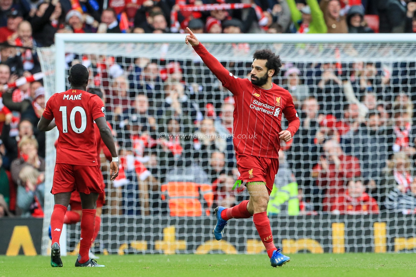 7th March 2020, Anfield, Liverpool, England; Premier League, Liverpool v Bournemouth : Mohamed Salah (11) of Liverpool celebrates his goal to make it 1-1