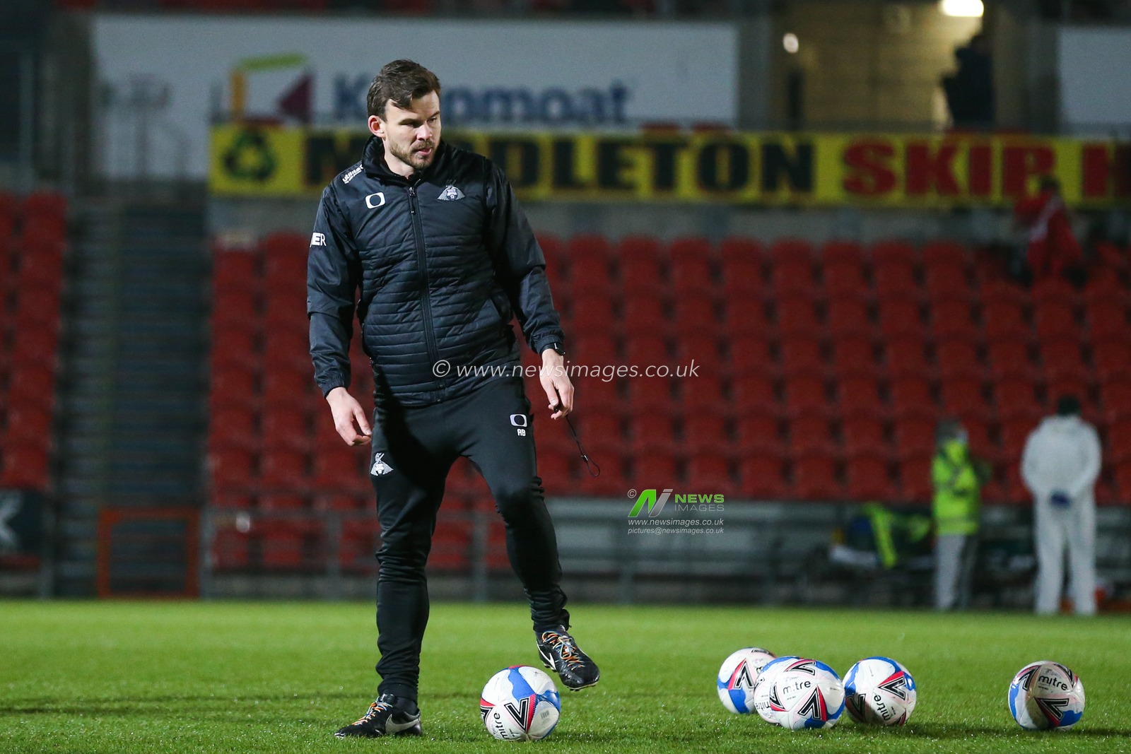 Andy Butler manager of Doncaster Rovers takes the warm up before the game