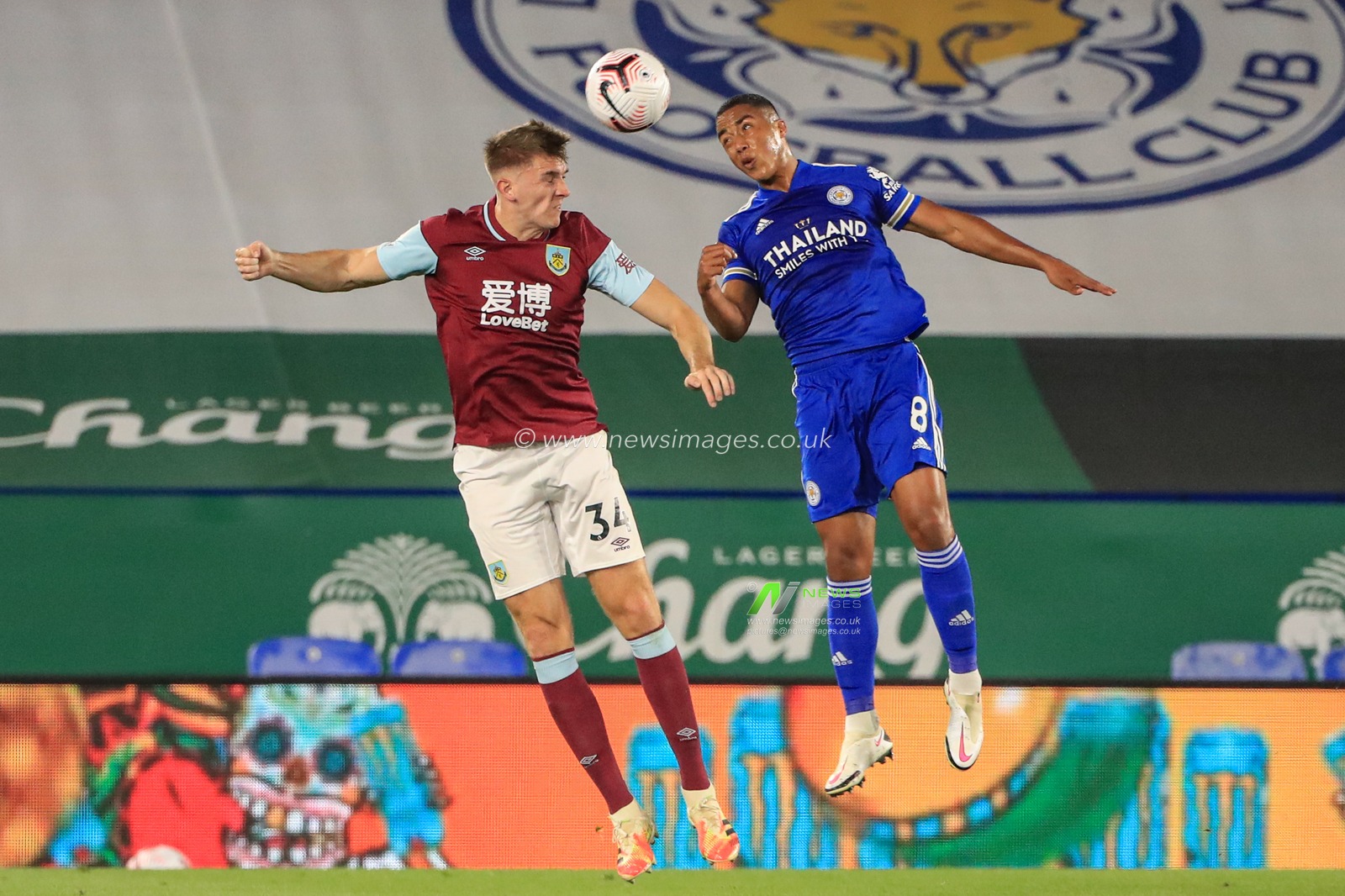 Youri Tielemans (8) of Leicester City and Jimmy Dunne (34) of Burnley battle for the ball