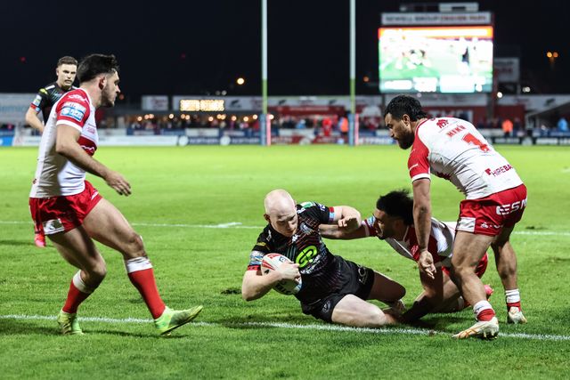 Liam Farrell of Wigan Warriors goes over for a try to make it 26-8 during the Betfred Super League Round 9 match Hull KR vs Wigan Warriors at Sewell Group Craven Park, Kingston upon Hull, United Kingdom, 26th April 2024

(Photo by Mark Cosgrove/News Images)