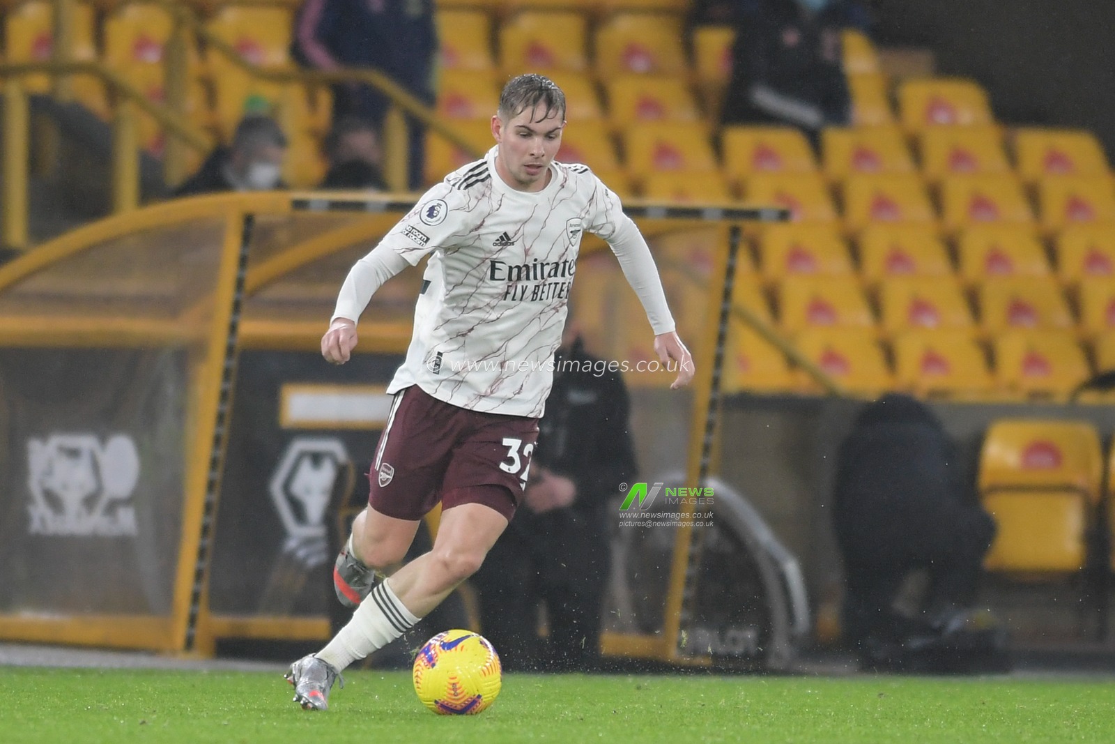 Emile Smith Rowe #32 of Arsenal with the ball
