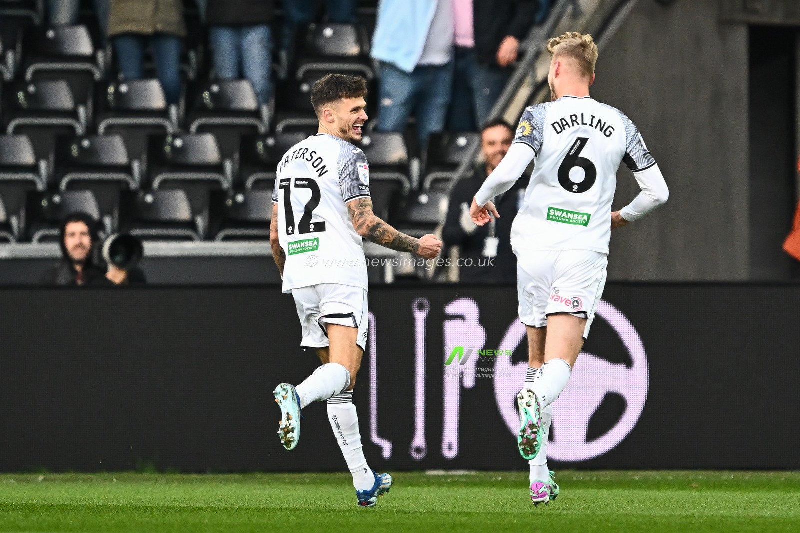 Jamie Paterson #12 of Swansea City celebrates his goal to make it 1-0 during the Sky Bet Championship match Swansea City vs Hull City at Swansea.com Stadium, Swansea, United Kingdom, 25th November 2023

(Photo by Craig Thomas/News Images)