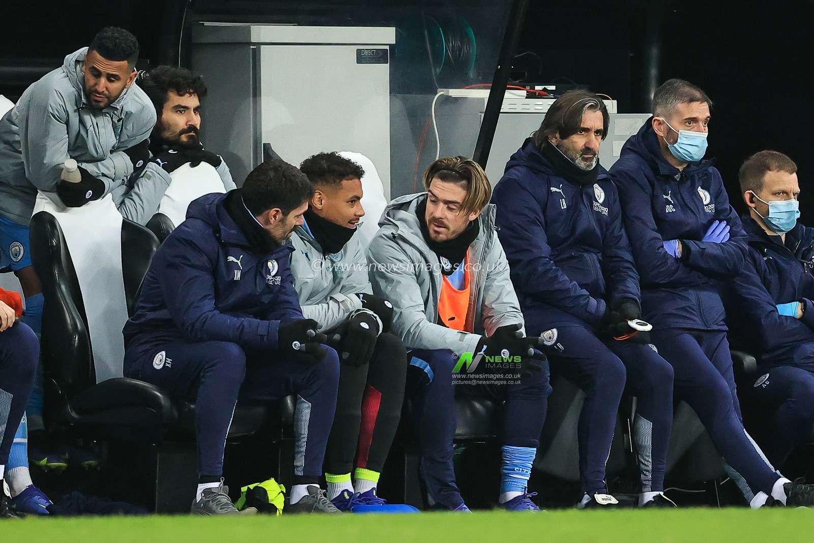 Jack Grealish #10 of Manchester City on the bench during the game