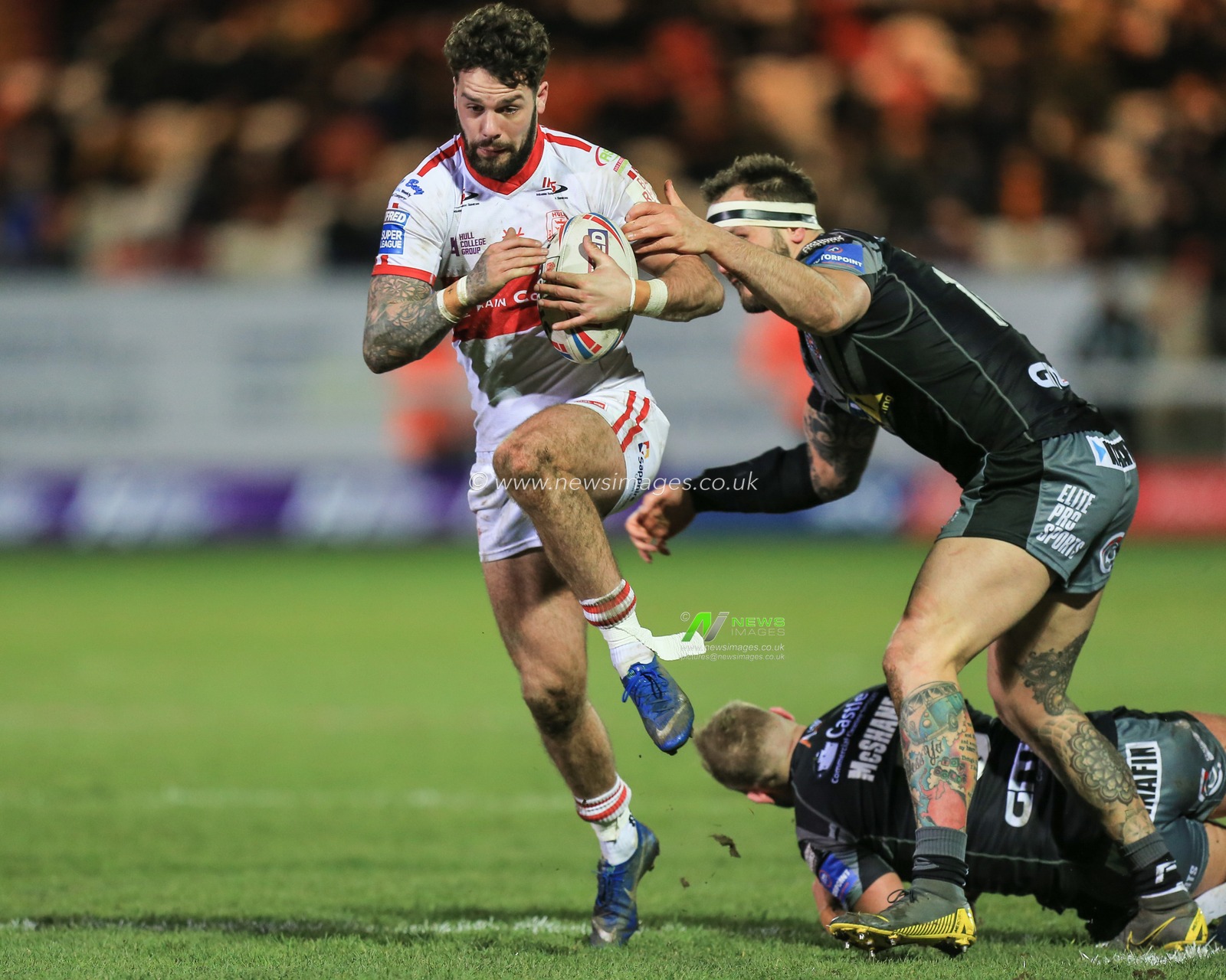 27th February 2020, Hull College Craven Park, Kingston upon Hull, England; Betfred Super League, Hull KR v Castleford Tigers : Will Dagger (19) of Hull KR gets away from George Griffin (16) of Castleford Tigers