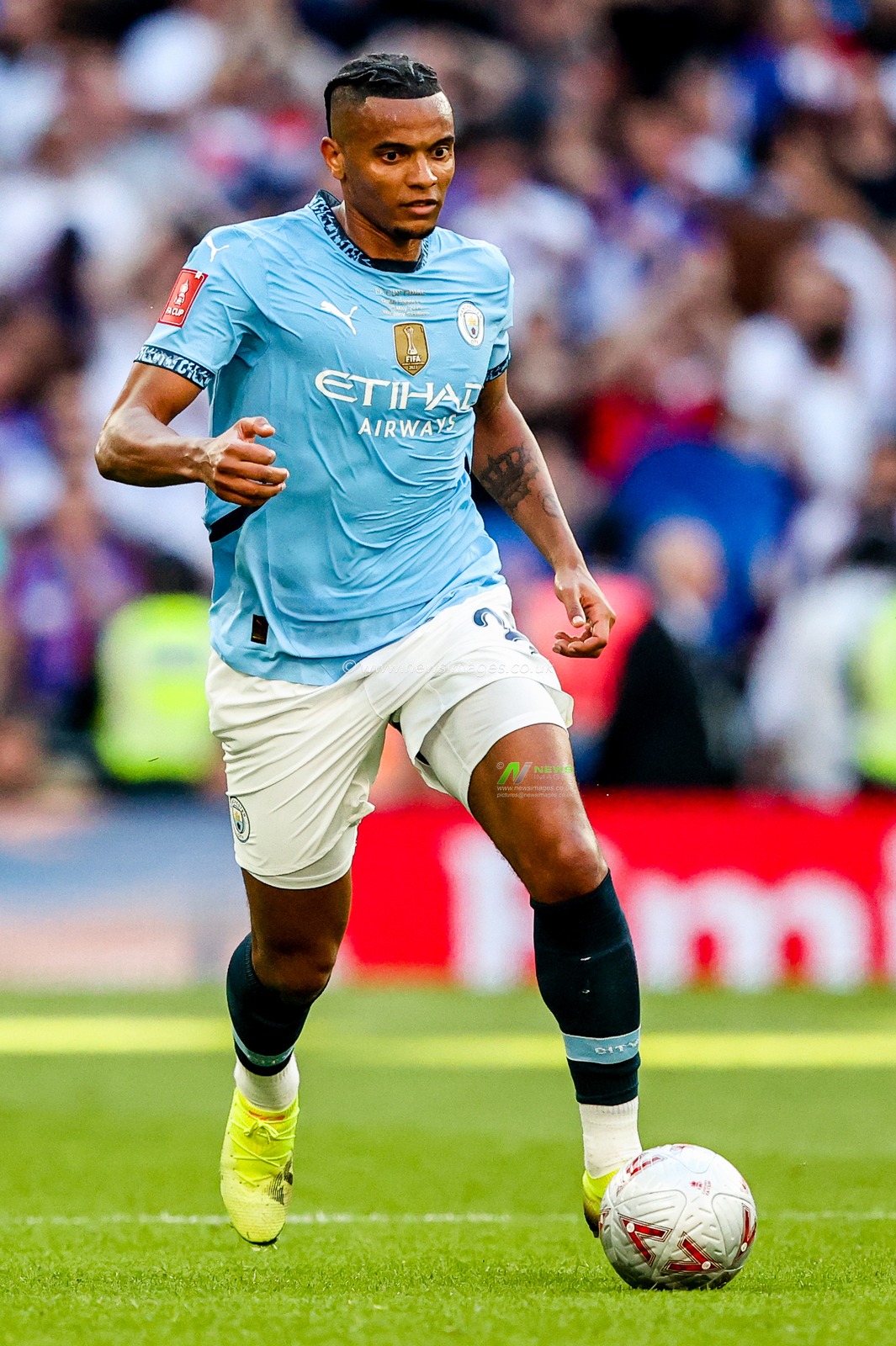 Manuel Akanji of Manchester City runs with the ball during the Emirates FA Cup Final match Crystal Palace vs Manchester City at Wembley Stadium, London, United Kingdom, 17th May 2025

(Photo by Alfie Cosgrove/News Images)