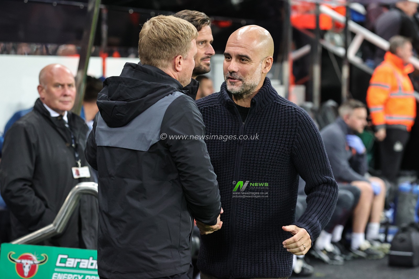 Pep Guardiola manager of Manchester City and Eddie Howe manager of Newcastle United shake hands before the game during the Carabao Cup Third Round match Newcastle United vs Manchester City at St. James's Park, Newcastle, United Kingdom, 27th September 2023

(Photo by Mark Cosgrove/News Images)