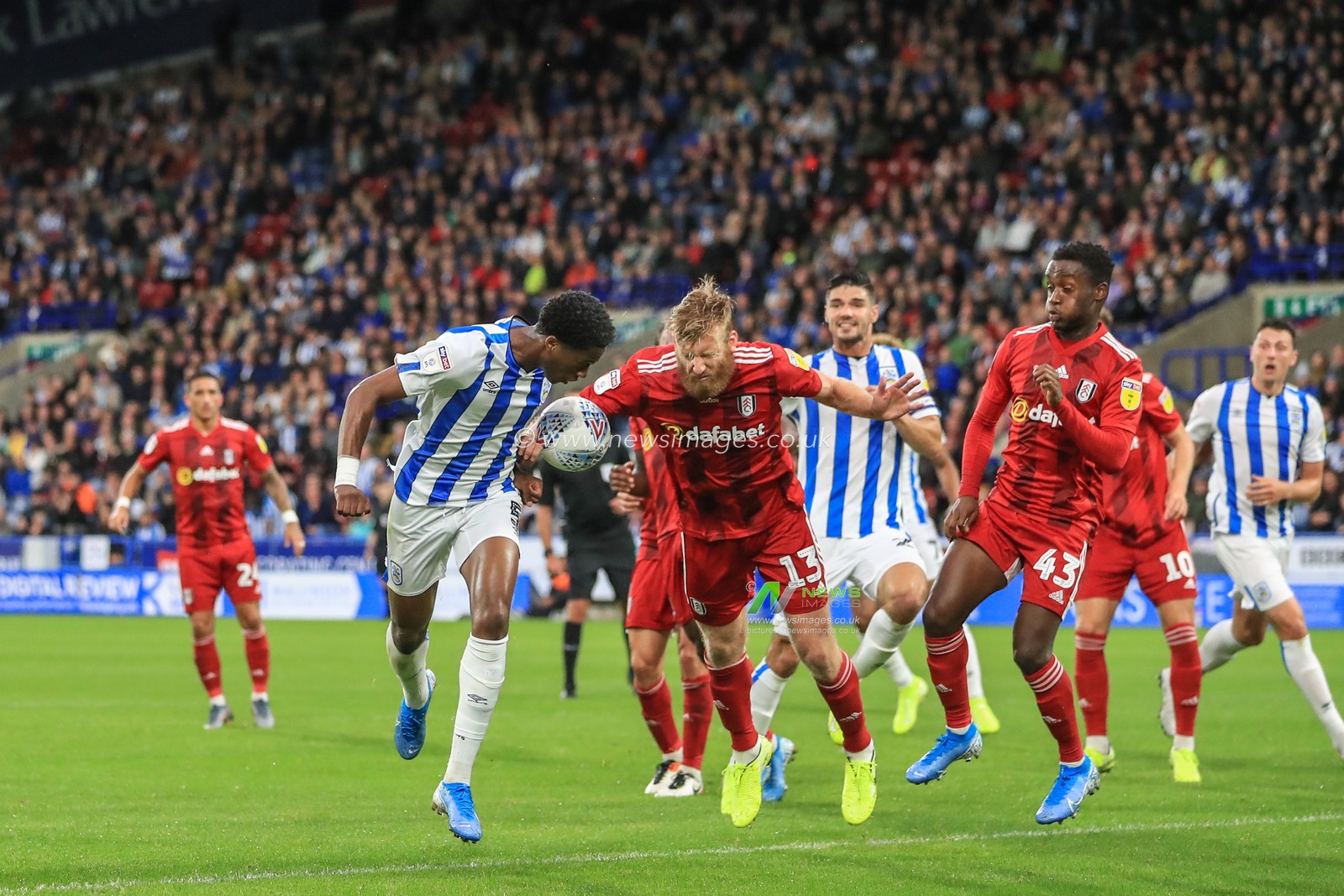 16th August 2019, John Smiths Stadium, Huddersfield England; Sky Bet Championship, Huddersfield Town vs Fulham ; Terence Kongolo (5) of Huddersfield Town and Tim Ream (13) of Fulham dual for the ball


Credit: Mark Cosgrove/News Images

English Football League images are subject to DataCo Licence