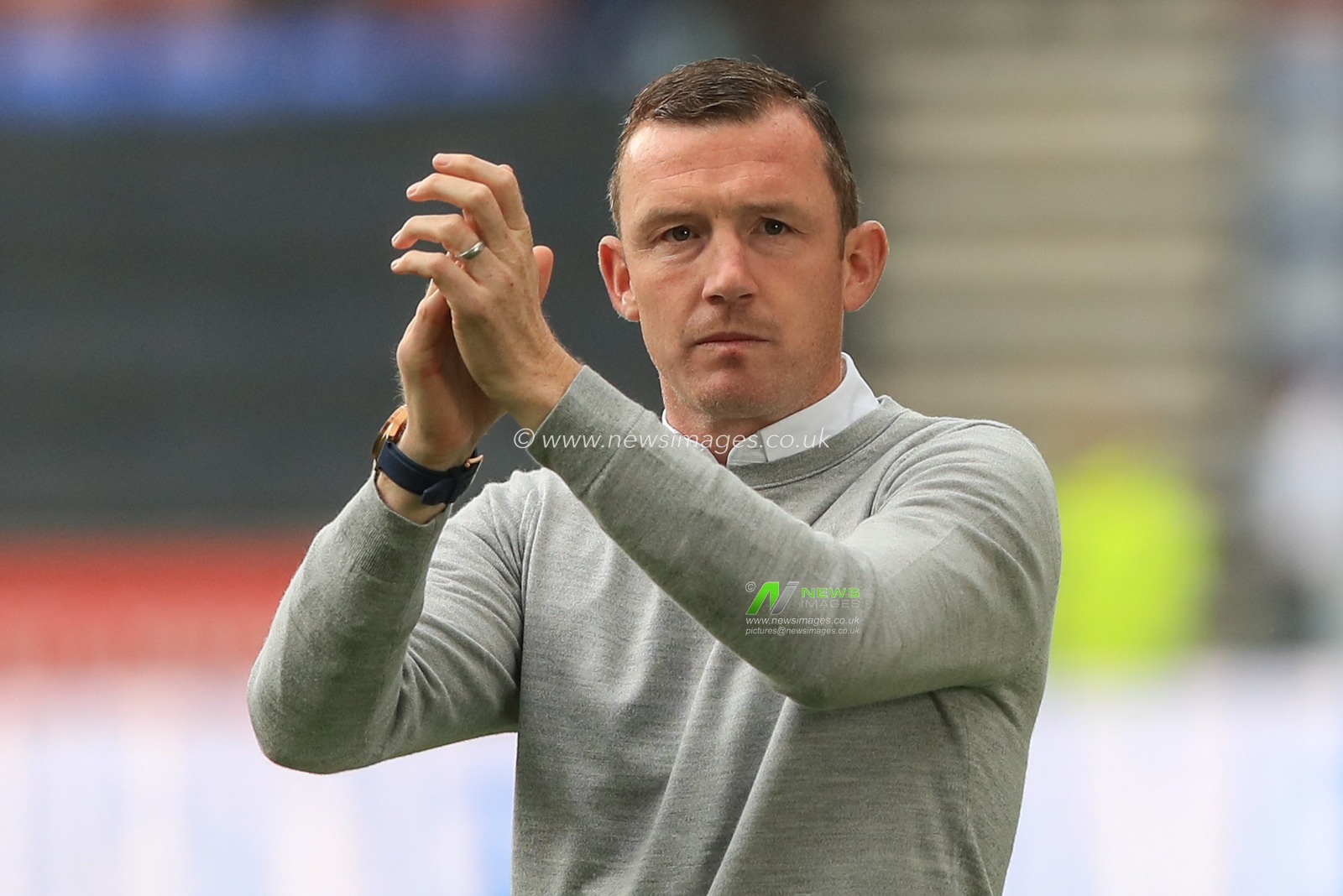 Neill Collins Head coach of Barnsley applauds the away fans after Barnsley win 0-2 during the Sky Bet League 1 match Wigan Athletic vs Barnsley at DW Stadium, Wigan, United Kingdom, 26th August 2023

(Photo by Alfie Cosgrove/News Images)