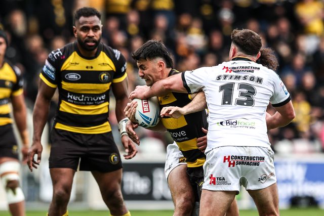 Cody Hunter of York Knights is tackled by Joe Stimson of Castleford Tigers during the Betfred Super League round 12 match York Knights vs Castleford Tigers at LNER Community Stadium, York, United Kingdom on 16 May 2026

(Photo by Alfie Cosgrove/News Images)