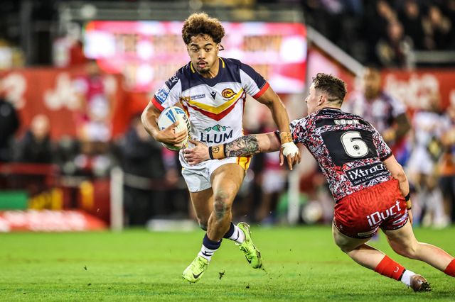 Phoenix Laulu-Togaga'e of Catalans Dragons evades a tackle from Adam Cook of Leigh Leopards during the Betfred Super League match Leigh Leopards vs Catalans Dragons at Leigh Sports Village, Leigh, United Kingdom on 06 March 2026

(Photo by Alfie Cosgrove/News Images)