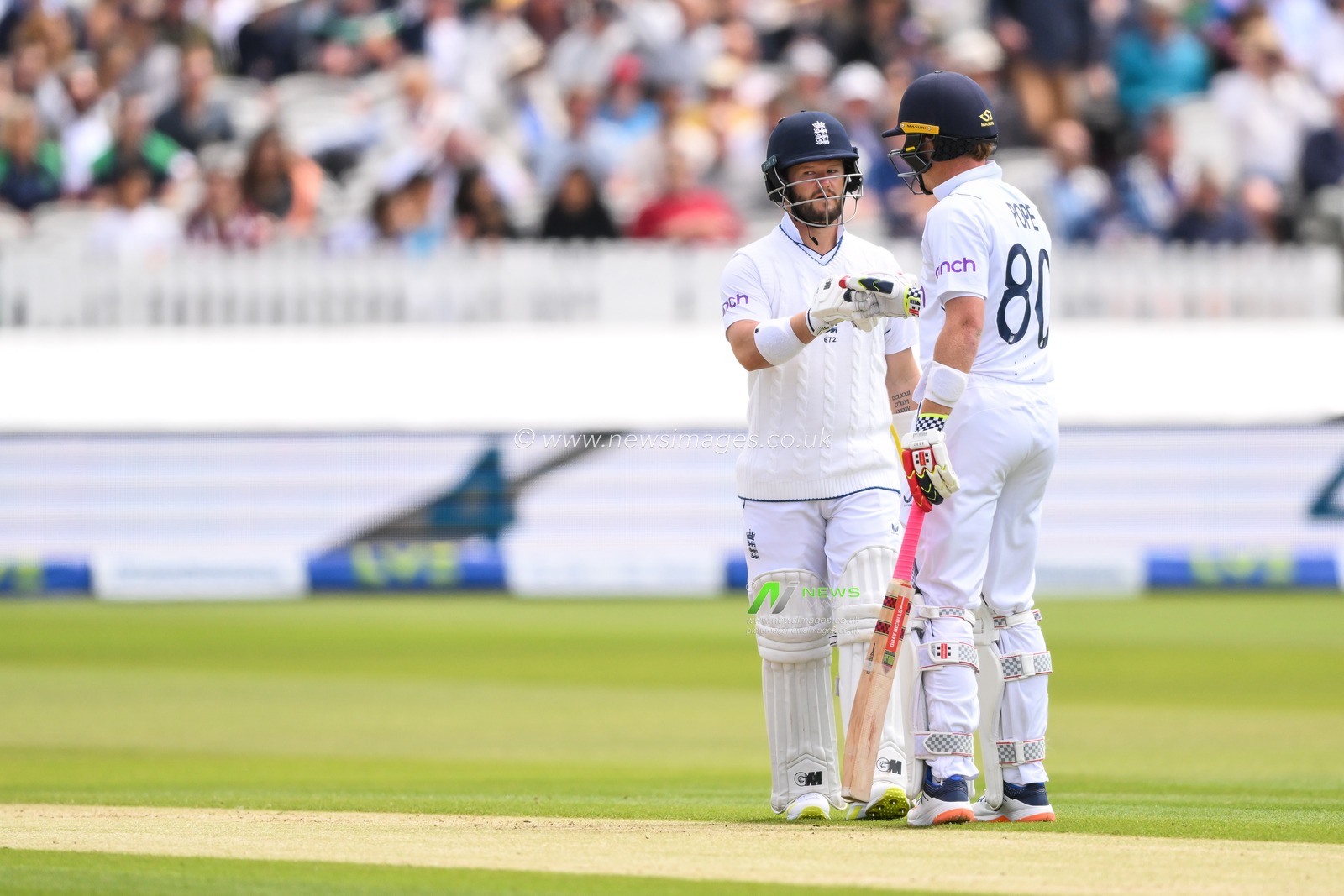 Ben Duckett of England and Ollie Pope of England bump fists after a four during the LV= Insurance Test match Day 2 England vs Ireland at Lords, London, United Kingdom, 2nd June 2023

(Photo by Craig Thomas/News Images)