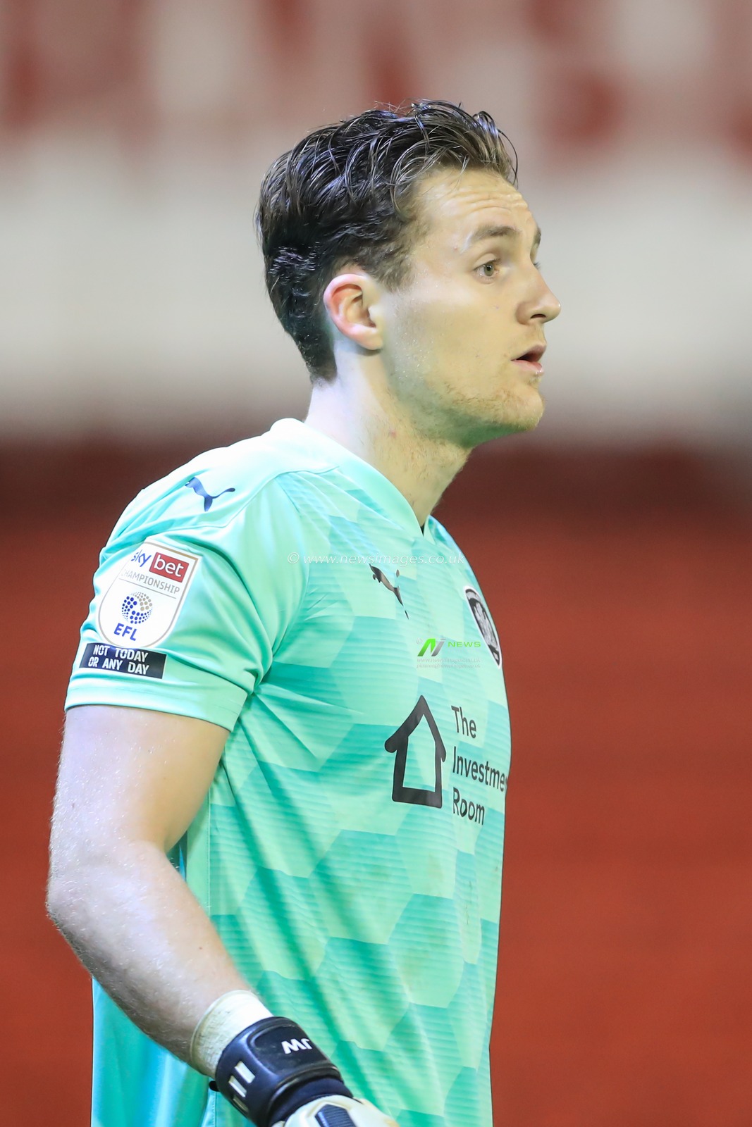 Jack Walton #1 of Barnsley gives his team instructions
