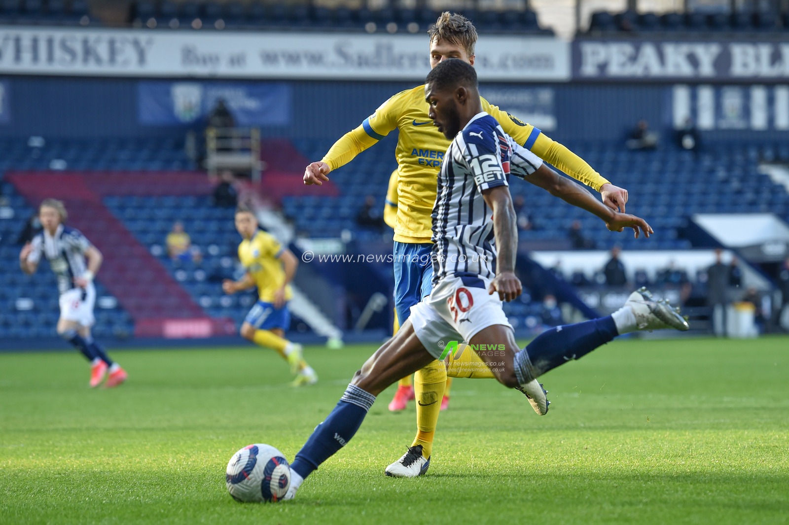 Ainsley Maitland-Niles #30 of West Bromwich Albion puts in the cross
