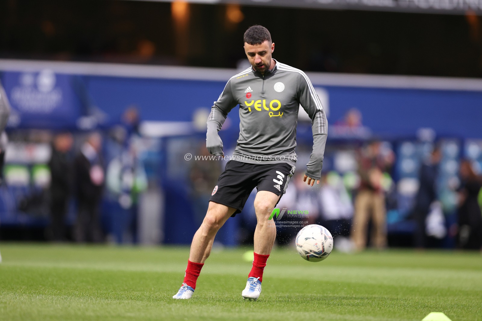 Enda Stevens of Sheffield United warms up.