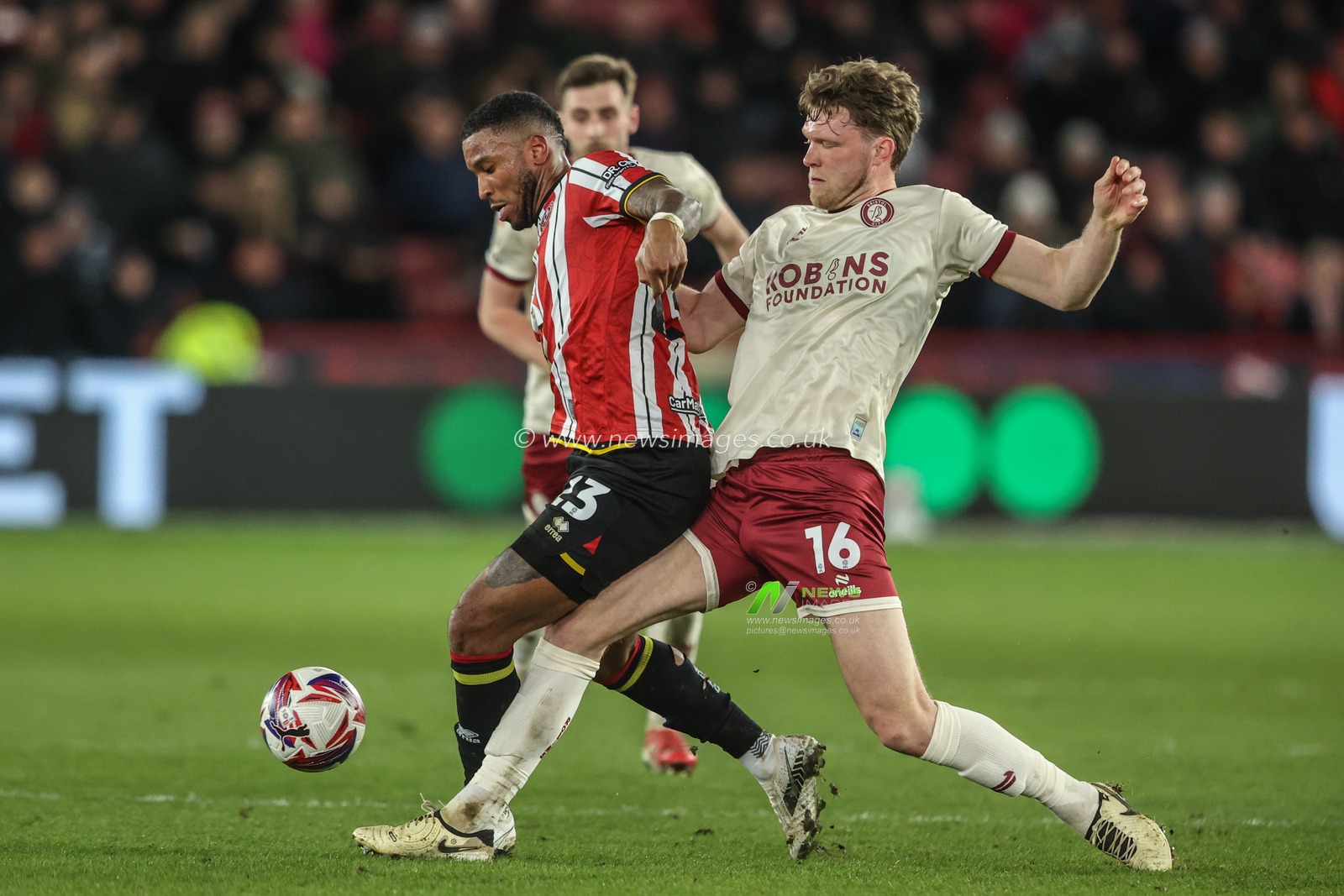 Tyrese Campbell of Sheffield United and Rob Dickie of Bristol City battle for the ball during the Sky Bet Championship match Sheffield United vs Bristol City at Bramall Lane, Sheffield, United Kingdom, 11th March 2025

(Photo by Alfie Cosgrove/News Images)