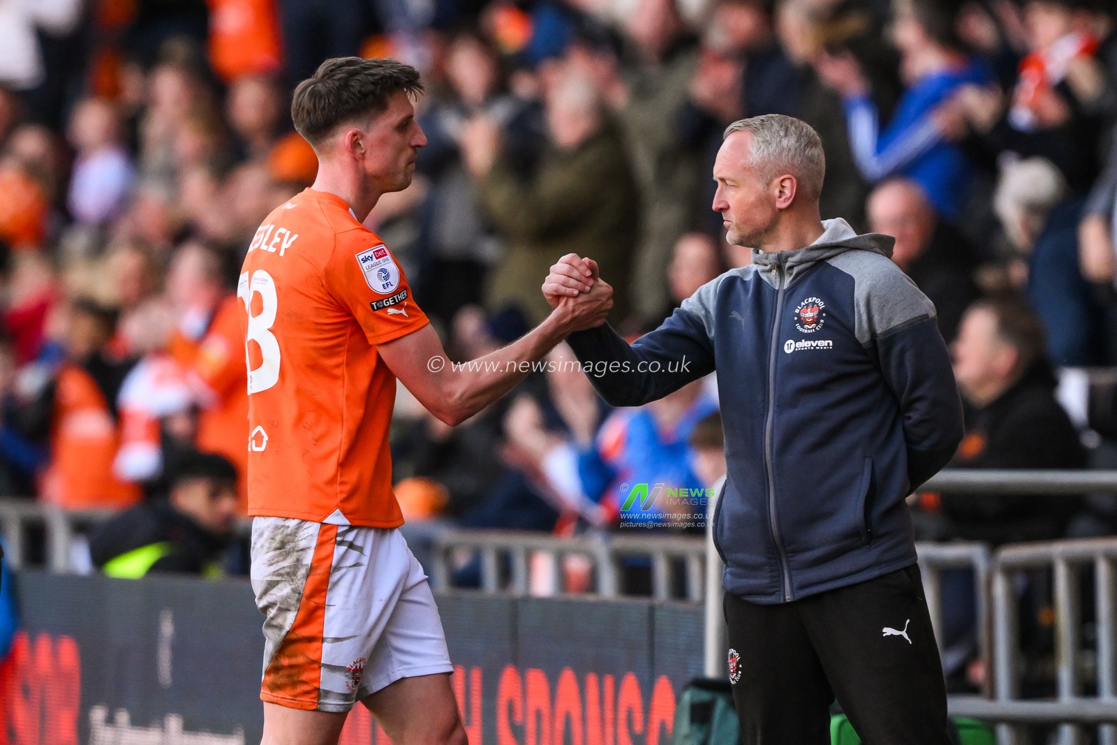 Neil Critchley manager of Blackpool shakes hands with Jake Beesley of Blackpool as he is substituted during the Sky Bet League 1 match Blackpool vs Barnsley at Bloomfield Road, Blackpool, United Kingdom, 20th April 2024

(Photo by Craig Thomas/News Images)