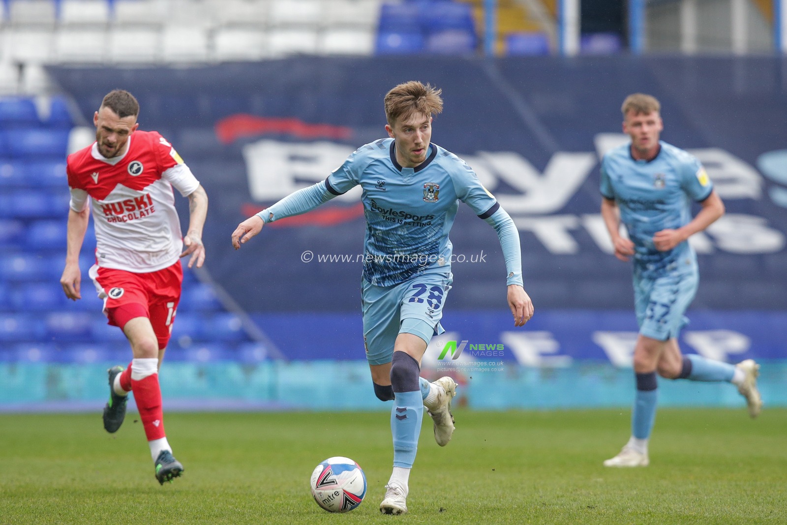 Josh Eccles #28 of Coventry City dribbles the ball