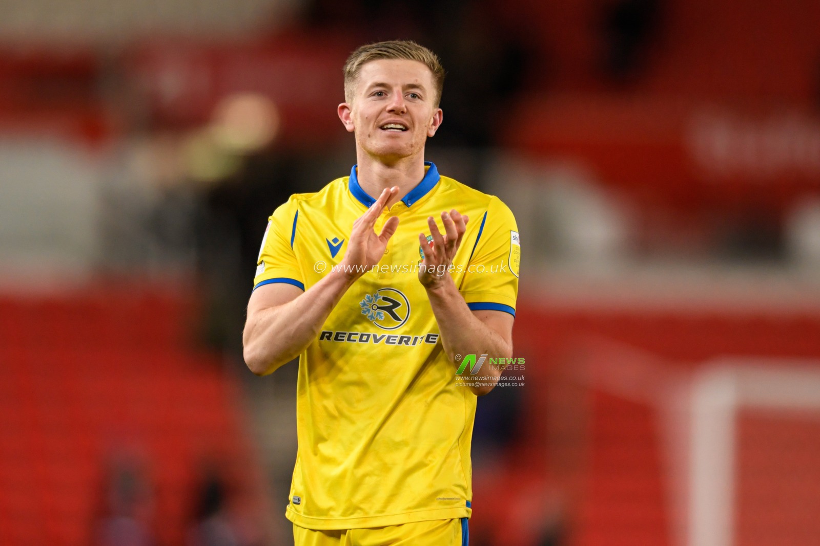 Scott Wharton #16 of Blackburn Rovers applauds the travelling supporters at the end of the game after his side beat Stoke City 0-1