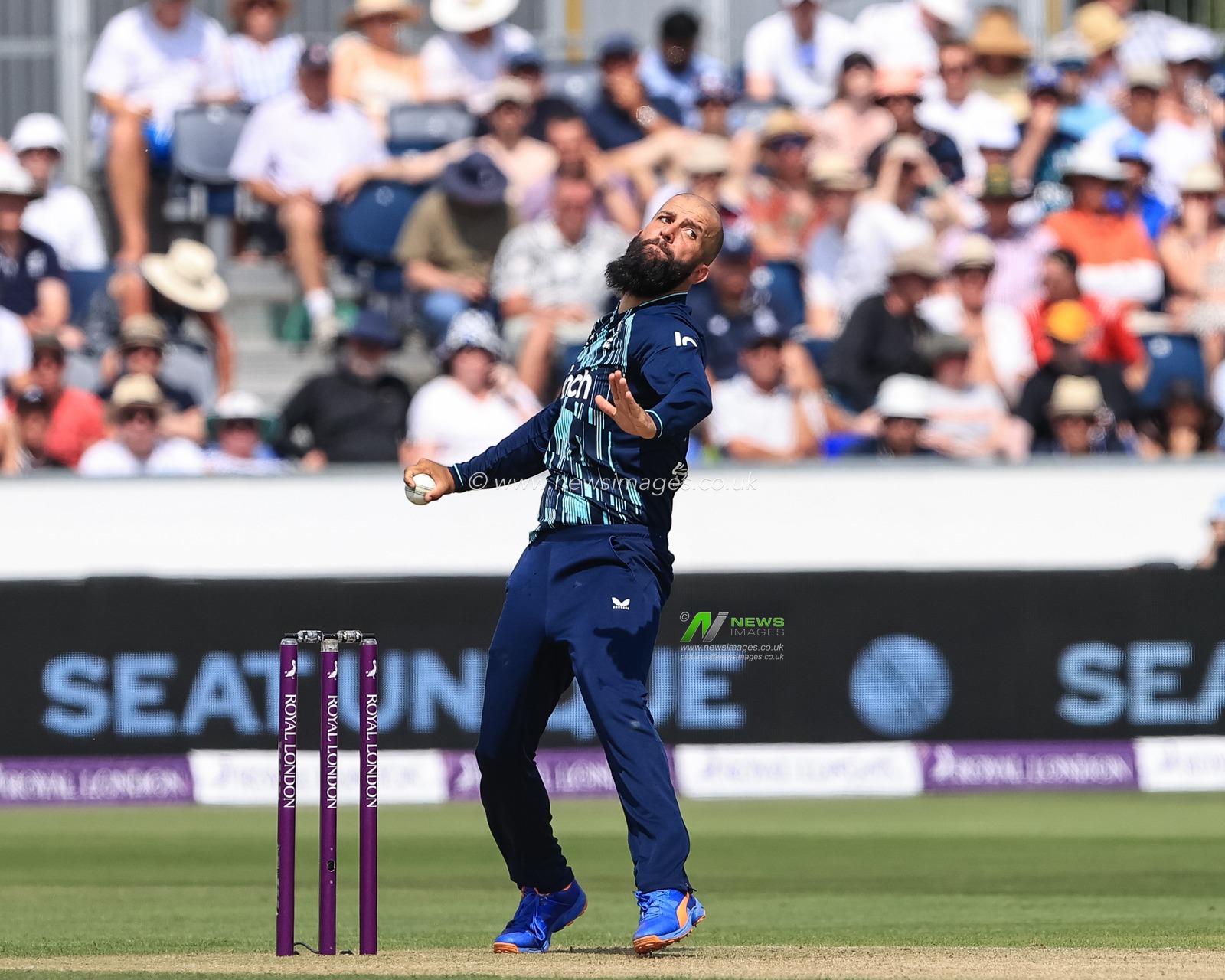 Moeen Ali of England delivers the ball