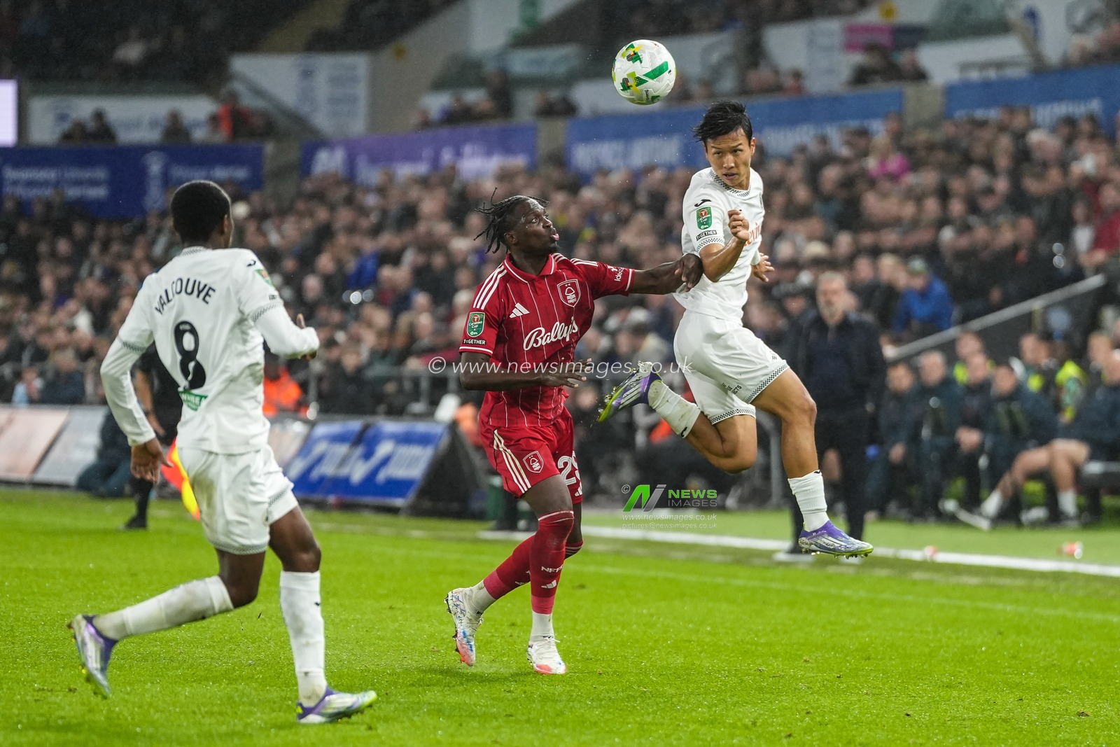 Eom Ji-Sung of Swansea City heads the ball during the Carabao Cup 3rd Round Swansea City vs Nottingham Forest at Swansea.com Stadium, Swansea, United Kingdom, 17th September 2025

(Photo by Andrew Lewis/News Images)