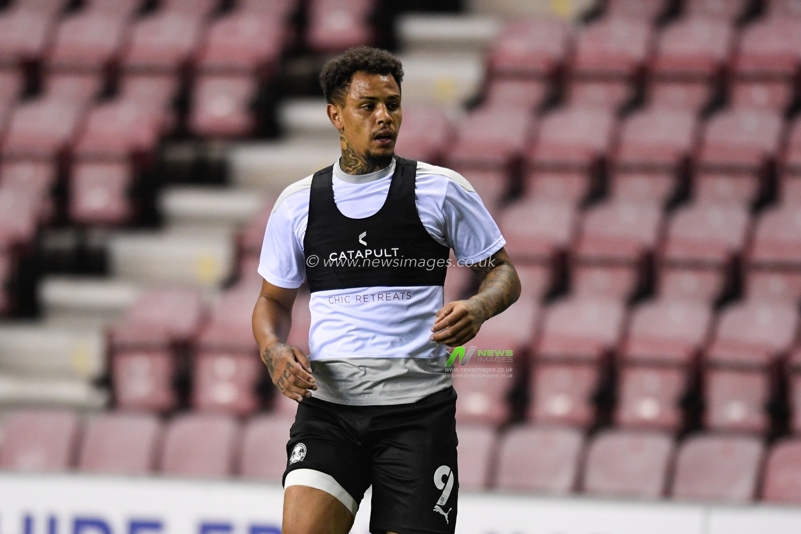 Jonson Clarke-Harris (9) of Peterborough United warming up before the game