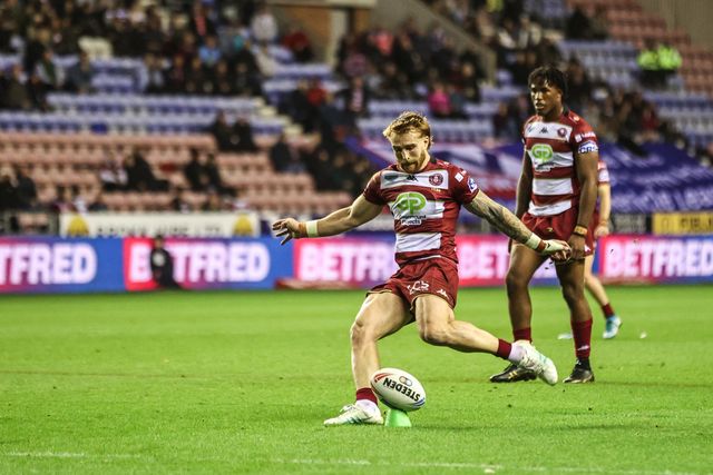 Adam Keighran of Wigan Warriors scores a penalty during the Betfred Super League Semi Final 1 match Wigan Warriors vs Leigh Leopards at The Brick Community Stadium, Wigan, United Kingdom, 3rd October 2025

(Photo by Alfie Cosgrove/News Images)