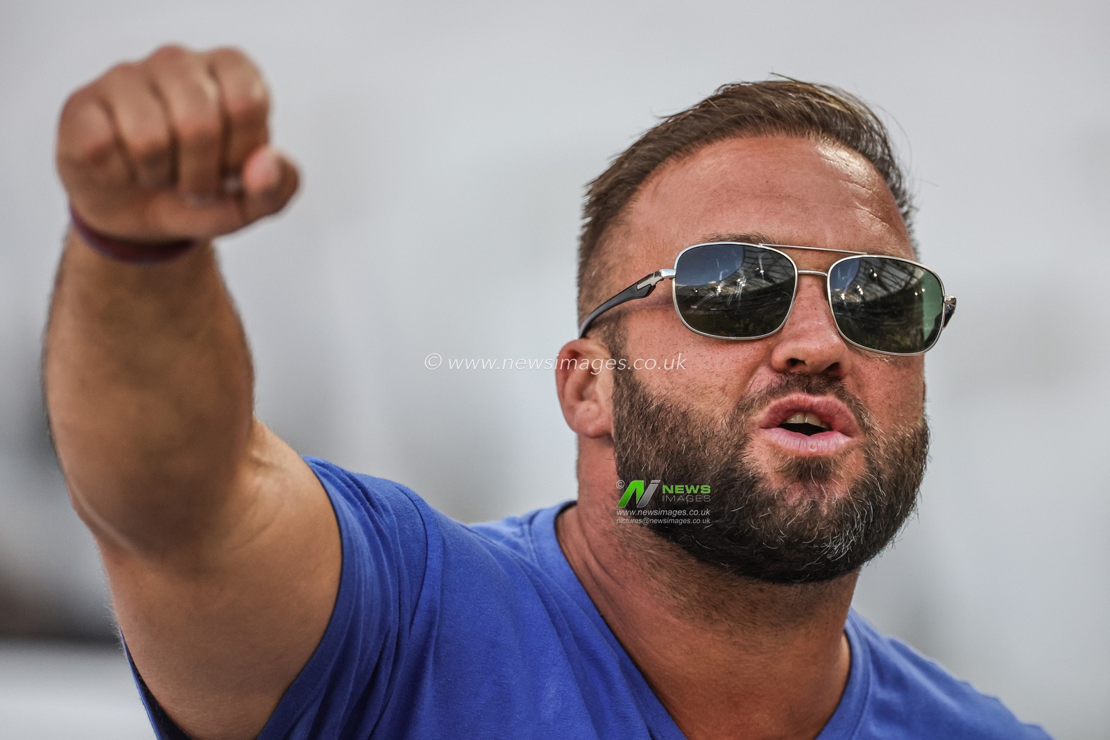 Chelsea fan sings as the London Stadium can be seen in the reflection of his glasses after the Premier League match West Ham United vs Chelsea at London Stadium, London, United Kingdom, 20th August 2023

(Photo by Mark Cosgrove/News Images)