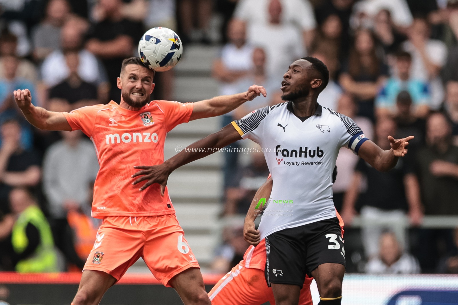 Matt Grimes of Coventry City jumps up to win the high ball during the Sky Bet Championship match Derby County vs Coventry City at Pride Park Stadium, Derby, United Kingdom, 16th August 2025

(Photo by Mark Cosgrove/News Images)