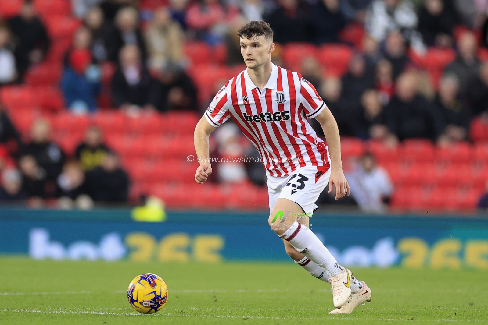 Luke McNally #23 of Stoke City runs with the ball during the Sky Bet Championship match Stoke City vs Millwall at Bet365 Stadium, Stoke-on-Trent, United Kingdom, 23rd December 2023

(Photo by Conor Molloy/News Images)