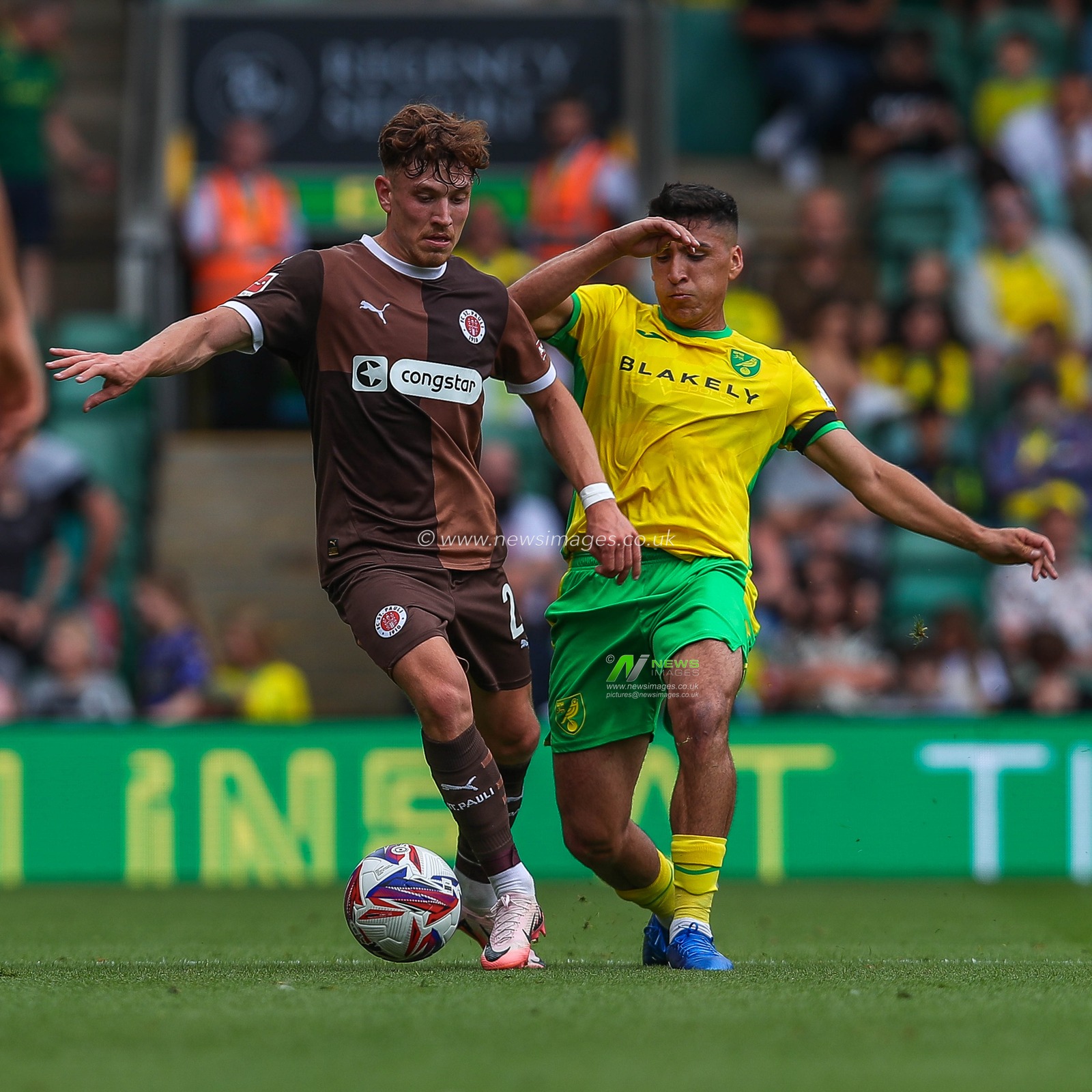 Philipp Treu of St Pauli battles for the ball with Marcelino Nunez of Norwich City during the Pre-season friendly match Norwich City vs St. Pauli at Carrow Road, Norwich, United Kingdom, 3rd August 2024

(Photo by Izzy Poles/News Images)