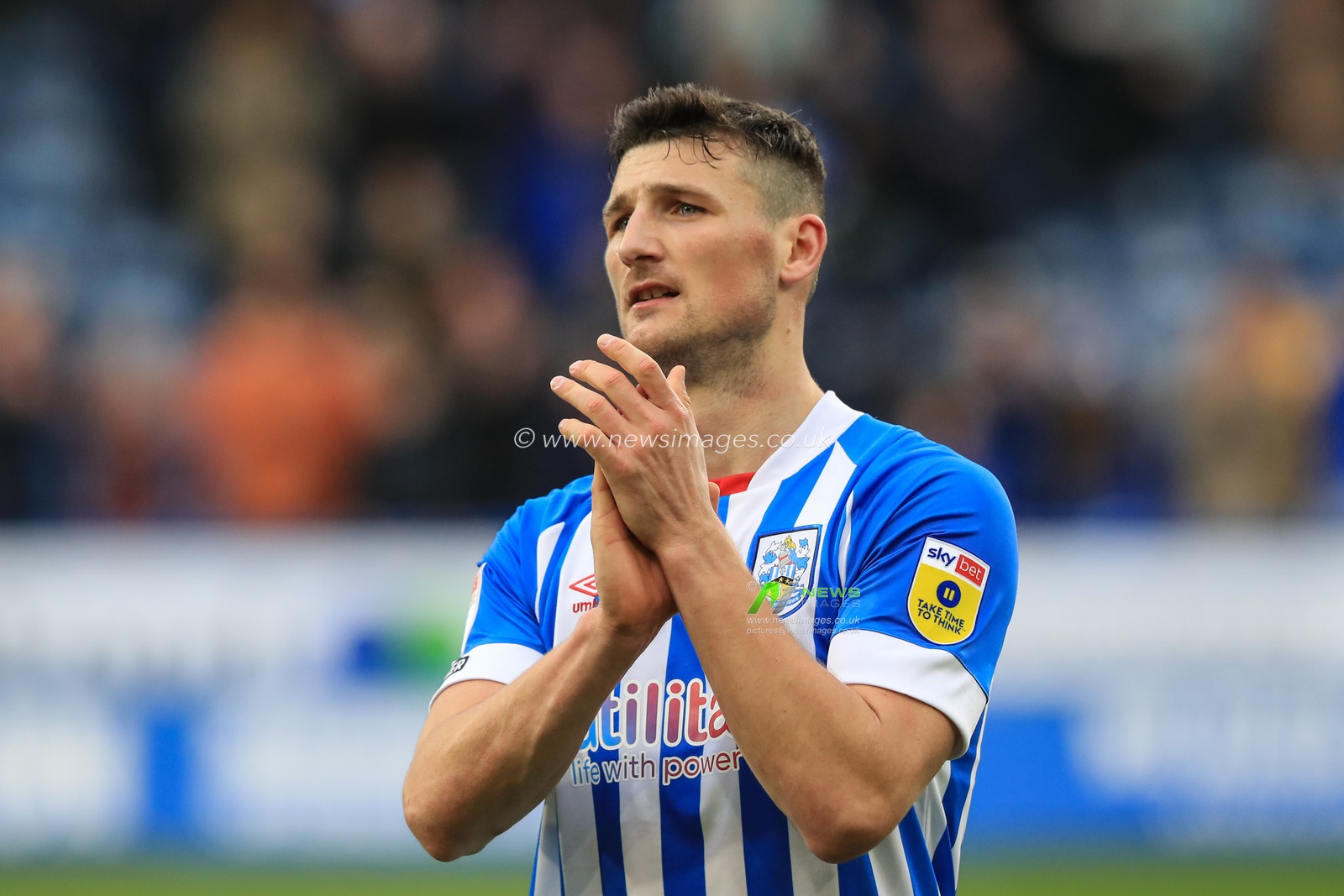 Matty Pearson #4 of Huddersfield Town applauds the home fans during the Sky Bet Championship match Huddersfield Town vs Middlesbrough at John Smith's Stadium, Huddersfield, United Kingdom, 1st April 2023

(Photo by Alfie Cosgrove/News Images)