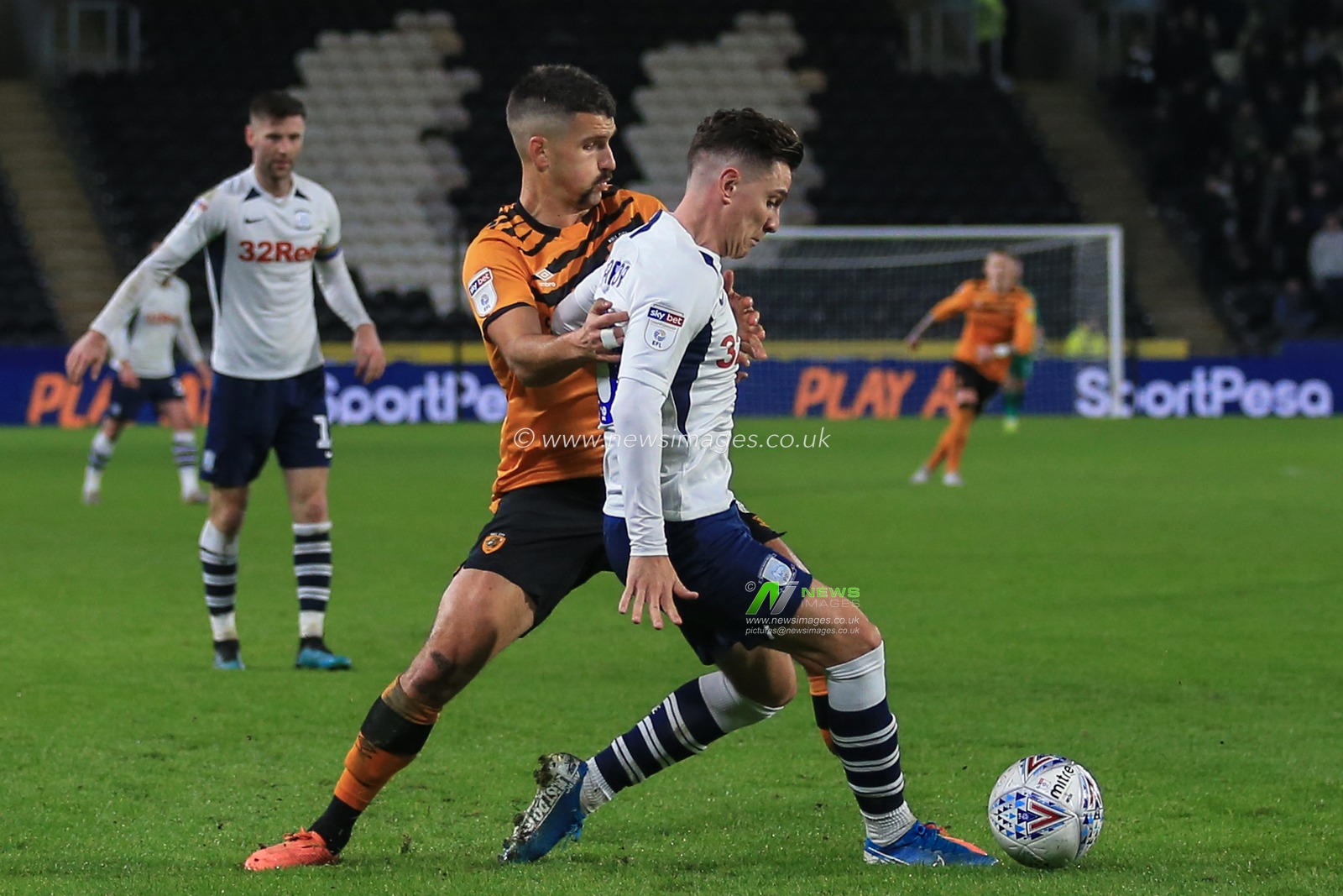 27th November 2019, KC Stadium, Kingston upon Hull, England; Sky Bet Championship, Hull City v Preston North End : Eric Lichaj (2) of Hull City and Josh Harrop (10) of Preston North End challenge for the ball

Credit: David Greaves/News Images
