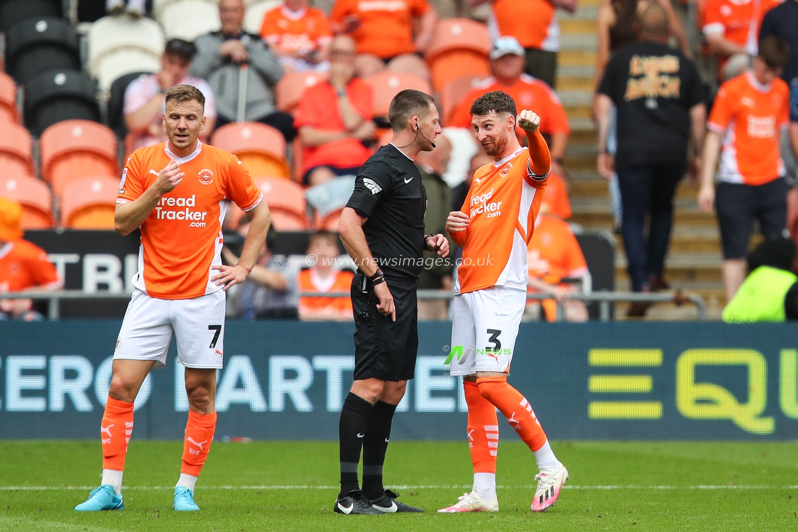James Husband of Blackpool talks to referee Simon Mather during the Sky Bet League 1 match Blackpool vs Stockport County at Bloomfield Road, Blackpool, United Kingdom, 17th August 2024

(Photo by Gareth Evans/News Images)