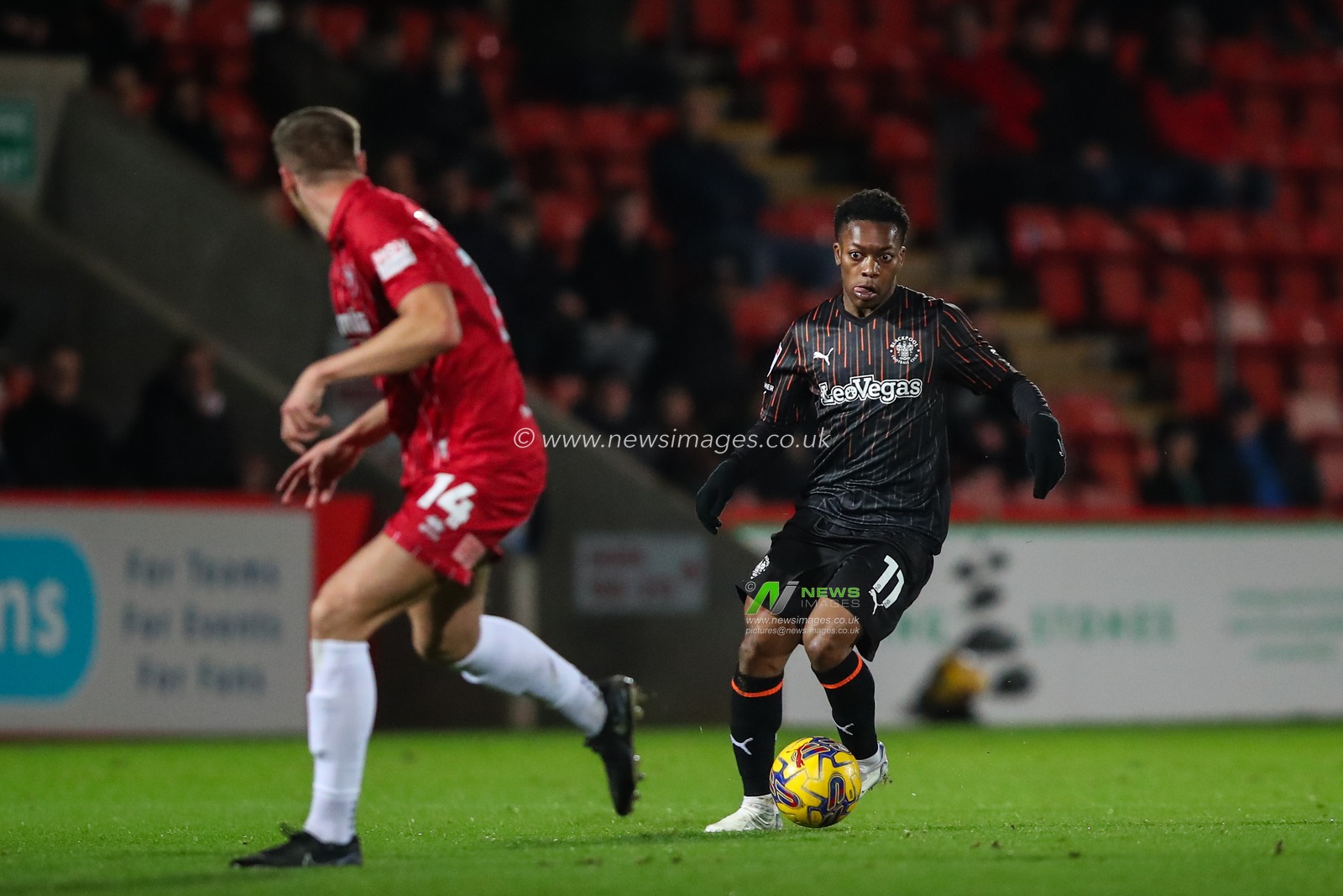 Karamoko Dembele of Blackpool breaks with the ball during the Sky Bet League 1 match Cheltenham Town vs Blackpool at The Completely-Suzuki Stadium, Cheltenham, United Kingdom, 13th February 2024

(Photo by Gareth Evans/News Images)