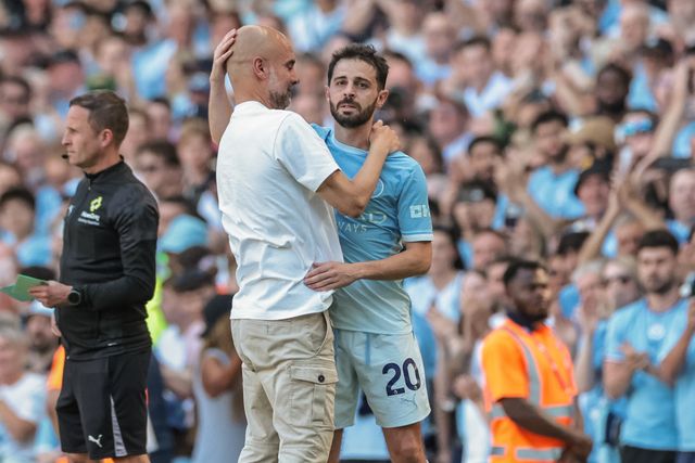 Pep Guardiola manager of Manchester City embraces Bernardo Silva of Manchester City after he’s substituted off during the Premier League match Manchester City vs Aston Villa at Etihad Stadium, Manchester, United Kingdom on 24 May 2026

(Photo by Mark Cosgrove/News Images)