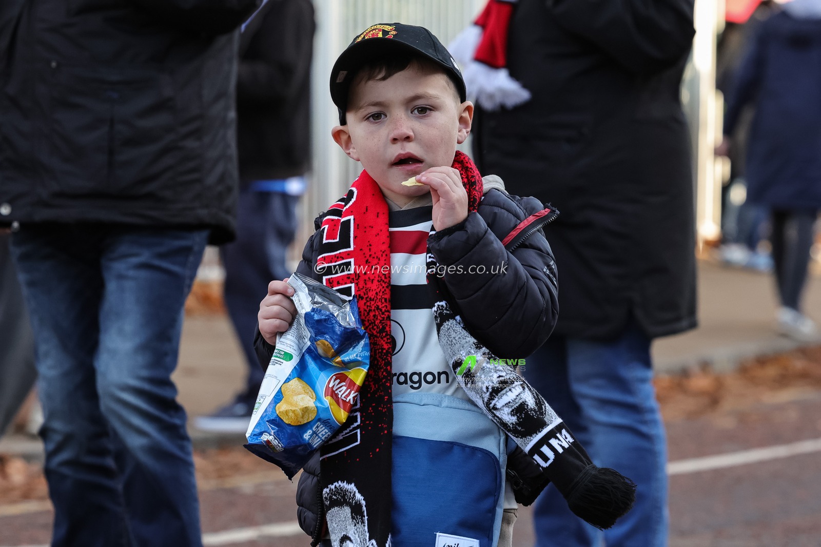 A young fan on his way to the game during the Premier League match Manchester United vs Brighton and Hove Albion at Old Trafford, Manchester, United Kingdom, 25th October 2025

(Photo by Mark Cosgrove/News Images)