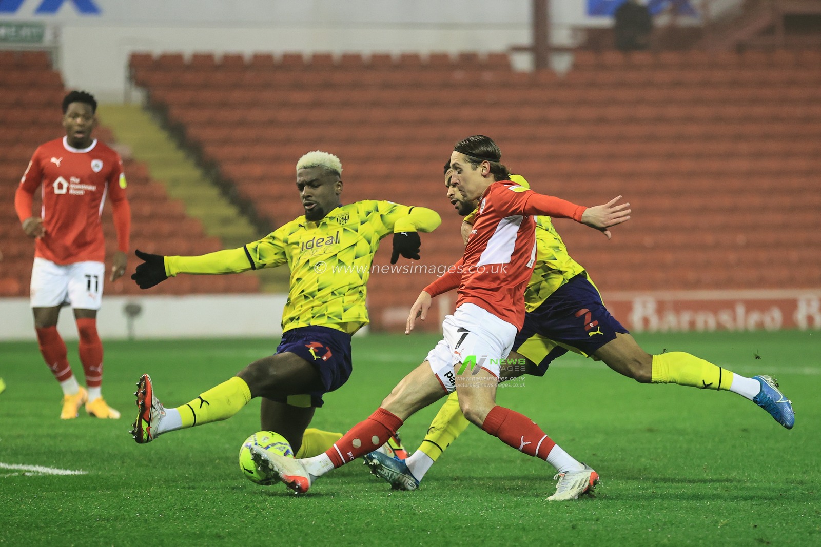 Callum Brittain #7 of Barnsley shoots on goal