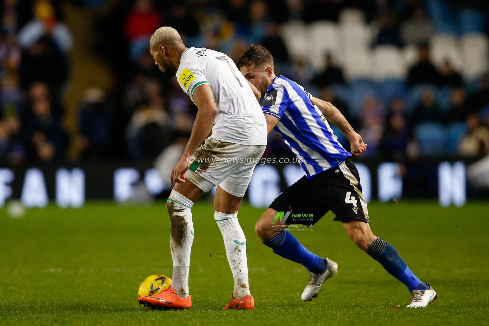 Will Vaulks #4 of Sheffield Wednesday and Joelinton #7 of Newcastle United during the Emirates FA Cup Third Round match Sheffield Wednesday vs Newcastle United at Hillsborough, Sheffield, United Kingdom, 7th January 2023

(Photo by Ben Early/News Images)
