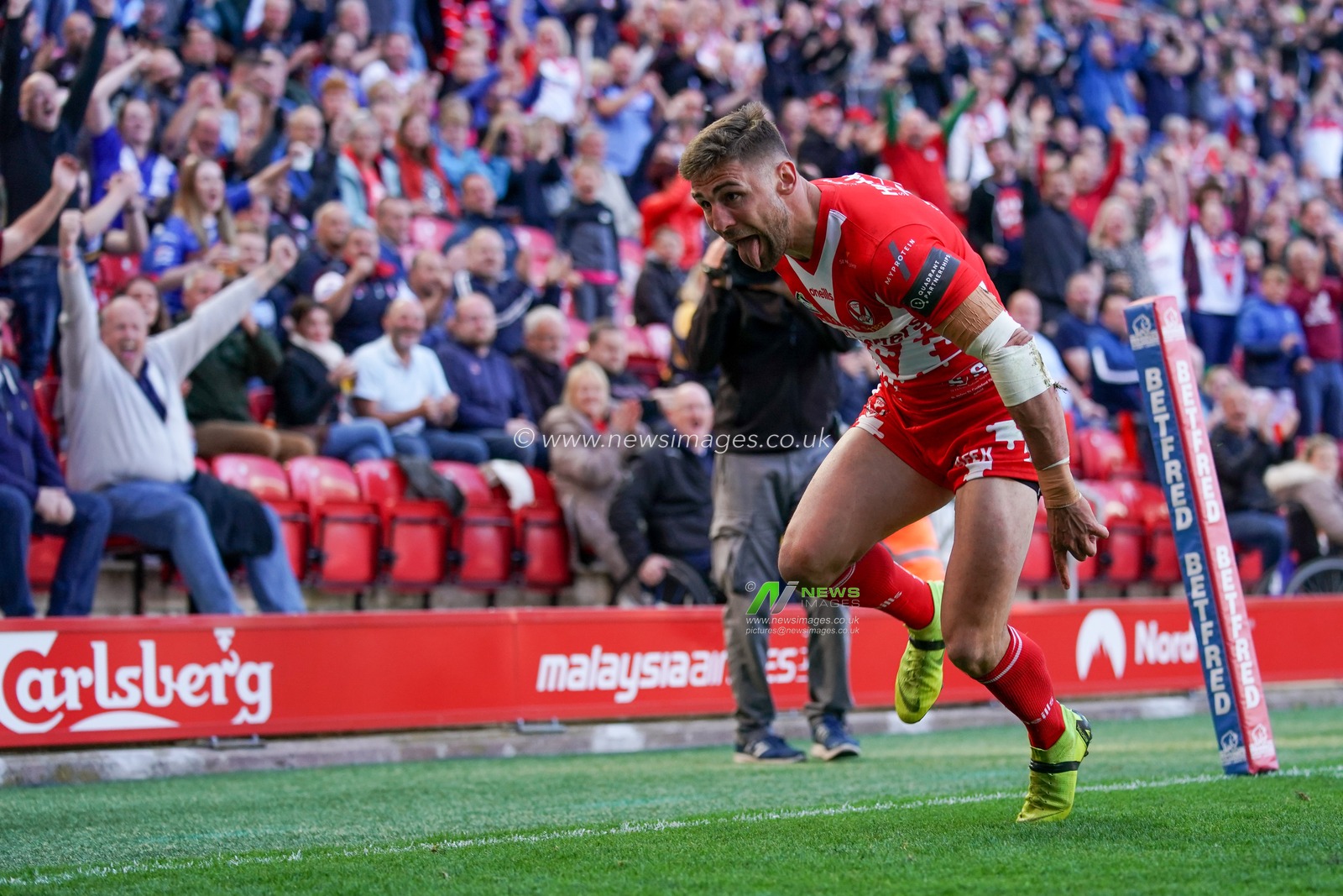 St. Helens's Tom Makinson celebrates scoring his sides first try

26th May 2019 , Anfield Stadium, Liverpool, England; Dacia Magic Weekend, Betfred Super League Round 16, St Helens vs Castleford Tigers ; 

Credit: Terry Donnelly/News Images
