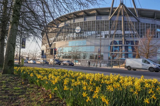 A general view of the Etihad Stadium through a bed of daffodils during the Premier League match Manchester City vs Nottingham Forest at Etihad Stadium, Manchester, United Kingdom on 04 March 2026

(Photo by Mark Cosgrove/News Images)