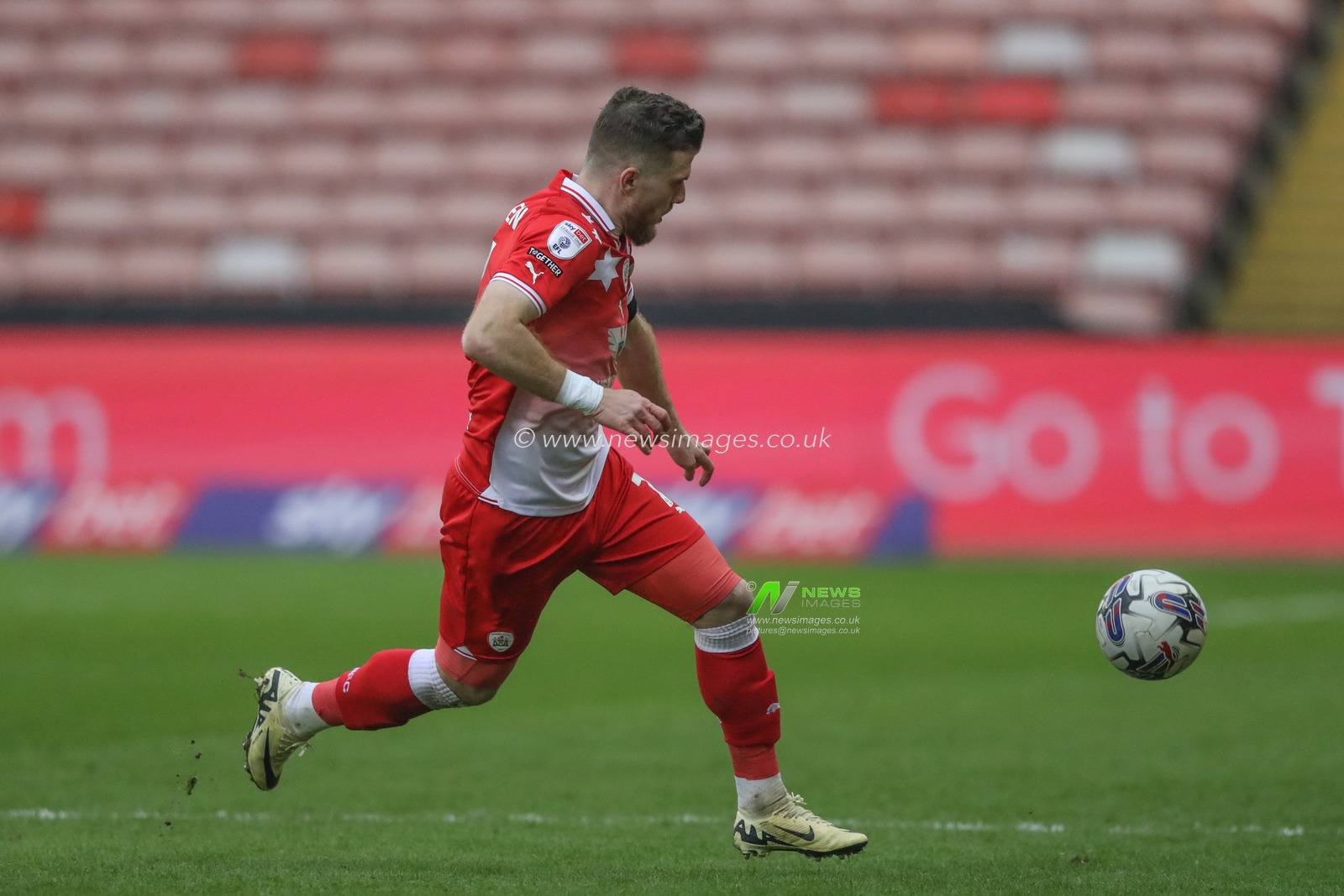 Nicky Cadden of Barnsley breaks with the ball during the Sky Bet League 1 match Barnsley vs Lincoln City at Oakwell, Barnsley, United Kingdom, 9th March 2024

(Photo by Alfie Cosgrove/News Images)